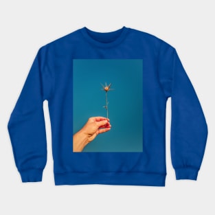 hand holding thistle Crewneck Sweatshirt